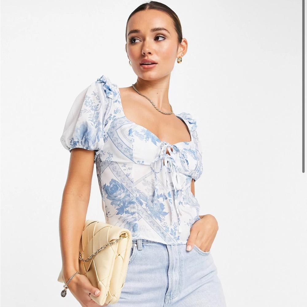 ASOS DESIGN short sleeved top with tie front in blue and white floral print